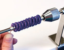 Wire coiled around tool